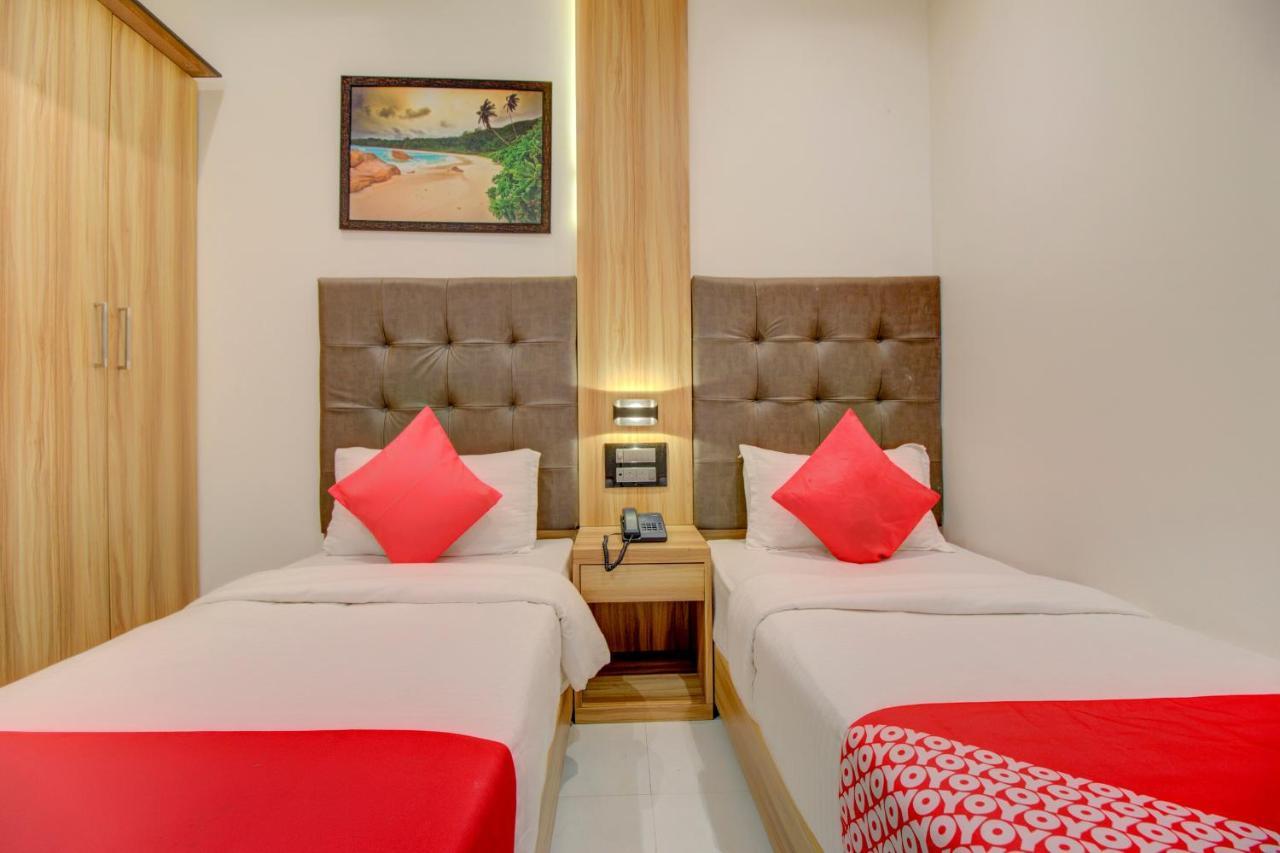 Oyo 76180 Hotel Meriton Мумбаи Экстерьер фото